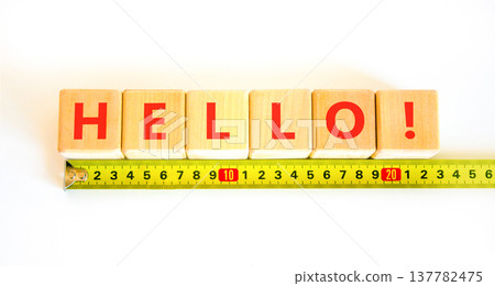 Hello welcome support help symbol. Concept word Hello on beautiful blocks. Beautiful white background. Beautiful yellow tape measure ruler. Business psychological hello support help concept Copy space Hello welcome support help symbol. Concept word Hello on beautiful blocks. Beautiful white background. Beautiful yellow tape measure ruler. Business psychological hello support help concept Copy space 137782475