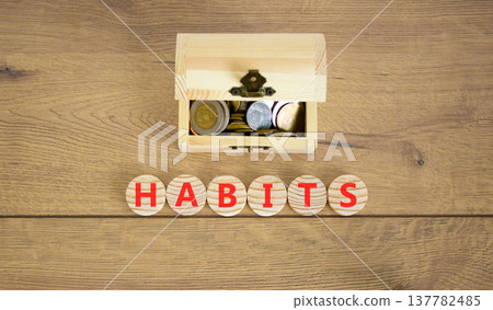 Habits support and help symbol. Concept word Habits on beautiful wooden circles. Beautiful wooden background. Wooden chest with coins. Business psychological habits support help concept. Copy space. Habits support and help symbol. Concept word Habits on beautiful wooden circles. Beautiful wooden background. Wooden chest with coins. Business psychological habits support help concept. Copy space. 137782485