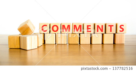 Comments comment word symbol. Concept word Comments on beautiful wooden blocks. Beautiful wooden table white background. Business support help comments comment word concept. Copy space. 137782516