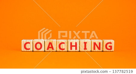 Coaching word symbol. Concept word Coaching on beautiful wooden blocks. Beautiful orange background. Business support help coaching word concept. Copy space. Coaching word symbol. Concept word Coaching on beautiful wooden blocks. Beautiful orange background. Business support help coaching word concept. Copy space. 137782519