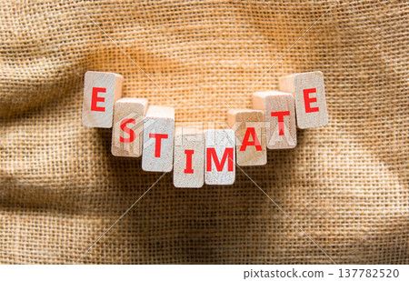 Estimate word symbol. Concept word Estimate on beautiful wooden blocks. Beautiful canvas background. Business support help estimate word concept. Copy space. Estimate word symbol. Concept word Estimate on beautiful wooden blocks. Beautiful canvas background. Business support help estimate word concept. Copy space. 137782520