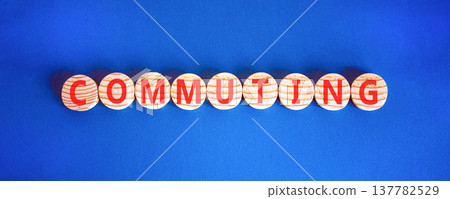 Commuting symbol. Concept word Commuting on beautiful wooden circles. Beautiful blue background. Business education commuting concept. Copy space. Commuting symbol. Concept word Commuting on beautiful wooden circles. Beautiful blue background. Business education commuting concept. Copy space. 137782529