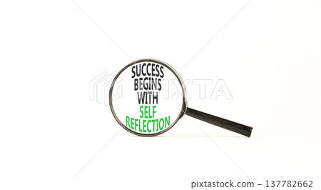 Self reflection symbol. Concept words Success begins with self reflection in beautiful magnifying glass. Beautiful white background. Business success begins with self reflection concept. Copy space. 137782662