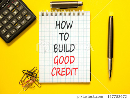 How to build good credit symbol. Concept words How to build good credit on beautiful white note. Beautiful yellow background. Black calculator. Business how to build good credit concept. Copy space. How to build good credit symbol. Concept words How to build good credit on beautiful white note. Beautiful yellow background. Black calculator. Business how to build good credit concept. Copy space. 137782672