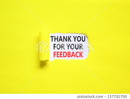 Thank you for your feedback symbol. Concept words Thank you for your feedback on beautiful white paper. Beautiful yellow paper background. Business thank you for your feedback concept. Copy space. 137782700