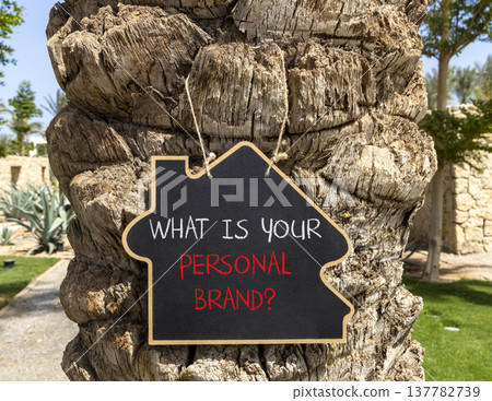 What is your personal brand symbol. Concept words What is your personal brand on beautiful blackboard. Beautiful palm tree background. Business what is your personal brand concept. Copy space. 137782739