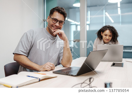 Evening Workers Racing Against Time. Evening Workers Diligently Striving To Complete Tasks On Schedule Evening Workers Racing Against Time. Evening Workers Diligently Striving To Complete Tasks On Schedule 137785054