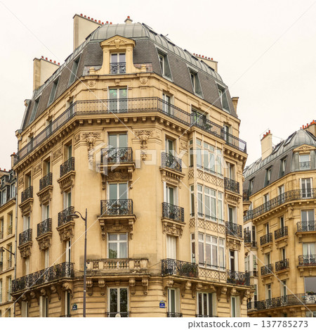 Traditional Haussmann architecture in Paris, France, showcasing classic historical building facades and ornate balconies 137785273