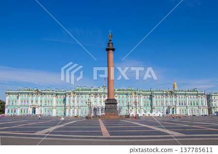 Russia, St. Petersburg, July 19, 2020 Palace Square, in the photo the building of the Hermitage and the Pillar of Alexandria, tourists walking around the square. Russia, St. Petersburg, July 19, 2020 Palace Square, in the photo the building of the Hermitage and the Pillar of Alexandria, tourists walking around the square. 137785611