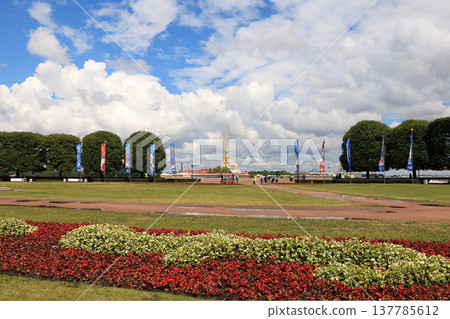 Russia, St. Petersburg, July 3, 2018, Birzhevaya Square on the Spit of Vasilyevsky Island. On the photo of the Exchange Square, the Peter and Paul Fortress in the background Russia, St. Petersburg, July 3, 2018, Birzhevaya Square on the Spit of Vasilyevsky Island. On the photo of the Exchange Square, the Peter and Paul Fortress in the background 137785612
