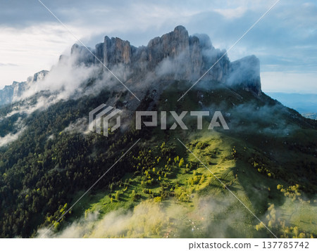 Above view of Bolshoy Tkhach with clouds in Caucasus mountains 137785742