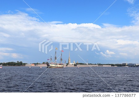 Russia, St. Petersburg, July 19, 2020. Military brig Poltava and the Peter and Paul Fortress in the water area of the Neva during the parade to the Day of the Navy Russia, St. Petersburg, July 19, 2020. Military brig Poltava and the Peter and Paul Fortress in the water area of the Neva during the parade to the Day of the Navy 137786077