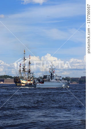 Russia, St. Petersburg, July 21, 2019, warships in the waters of the Neva and the Peter and Paul Fortress, preparation for the parade of the Navy, rehearsal. 137786087