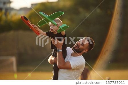 Happy father with son on the field Happy father with son on the field 137787011