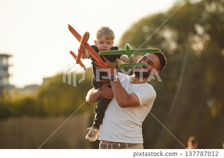Happy father with son on the field 137787012