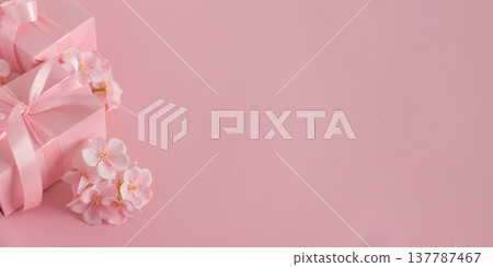 Pink Gift Boxes and Chery Blossom. Romantic Valentines  or Mothers Day Flatlay on Soft Pink Background 137787467