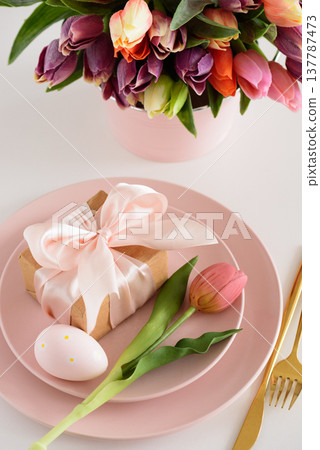 Easter Table Setting with Gift Box, Decorated Eggs and Tulips. Festive Spring Lifestyle 137787473