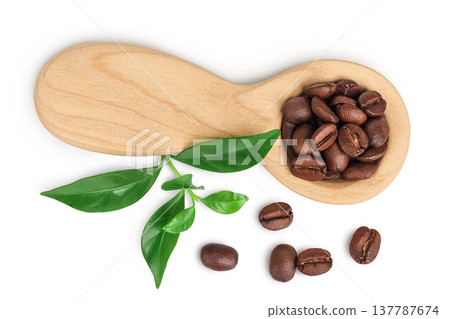 Coffee beans in wooden spoon isolated on a white background. Top view 137787674
