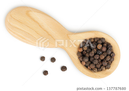 Black peppercorns or pepper in a wooden spoon isolated on a white background. Top view. Flat lay 137787680