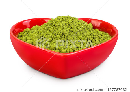 Green matcha powder in red ceramic bowl isolated on white background. Top view 137787682