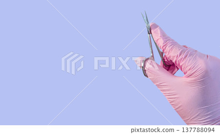Manicure scissors cuticle tool for nails salon hygiene sterile glove copyspace on blue background Manicure scissors cuticle tool for nails salon hygiene sterile glove copyspace on blue background 137788094