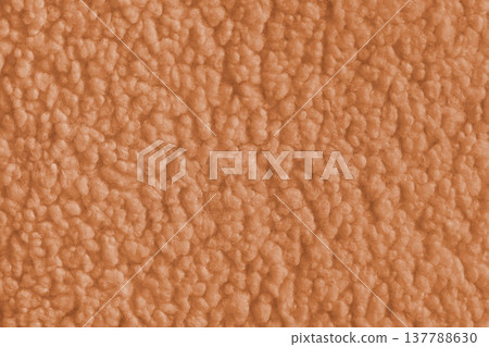 Orange color soft faux fur cloth texture with fluffy plush surface for cozy fabric backgrounds Orange color soft faux fur cloth texture with fluffy plush surface for cozy fabric backgrounds 137788630