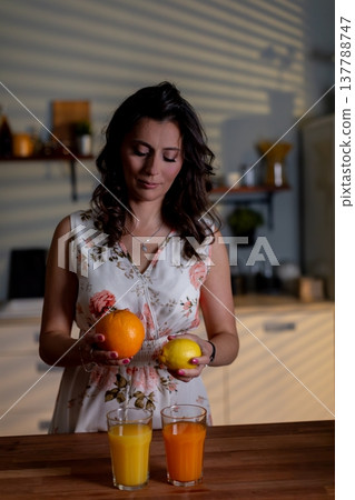 Woman with drinks, Pensive lady holding citrus drinks, Serene woman clutching juice glasses thoughtfully, Calm female figure with citrus beverages and floral attire Woman with drinks, Pensive lady holding citrus drinks, Serene woman clutching juice glasses thoughtfully, Calm female figure with citrus beverages and floral attire 137788747
