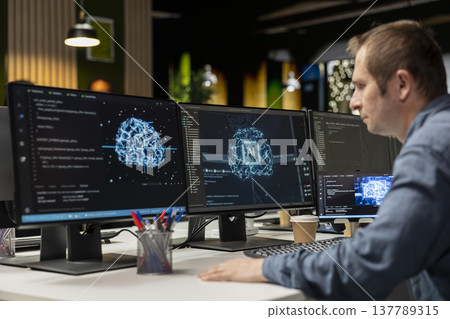 Engineer typing on PC keyboard in startup office, coding advanced machine learning models enhancing automation. IT expert uses AI on computer at Silicon Valley workplace desk 137789315