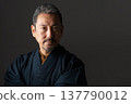 A man wearing a kimono 137790012