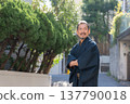A man wearing a kimono 137790018