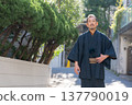 A man wearing a kimono 137790019