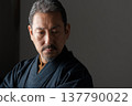 A man wearing a kimono 137790022