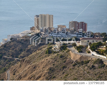 Picturesque Seaside Route Through Hills, Beautiful Winding Path Along Oceanfront Properties 137790185