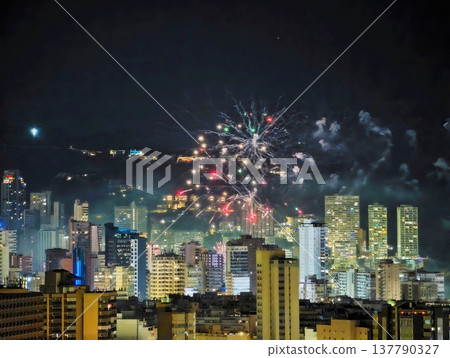 Dramatic Aerial Footage Captures Spectacular Fireworks Illuminating Dense City Skyline After Evening Dramatic Aerial Footage Captures Spectacular Fireworks Illuminating Dense City Skyline After Evening 137790327