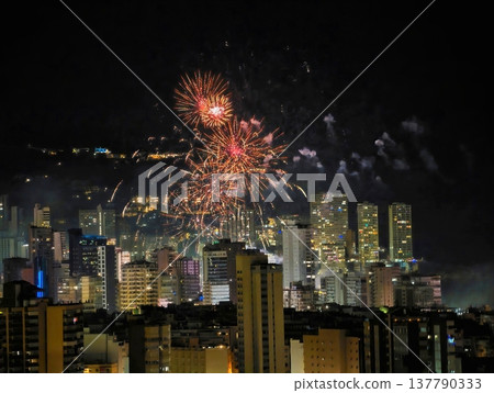 Skyline Glows Softly Tonight, Subtle Luminous Displays Dance Above Quiet Urban Rooftops Tonight 137790333