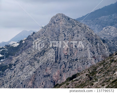 Cliff Face Illustration, Rugged Mountain Slope Showing Detailed Stratification And Sparse Flora Cliff Face Illustration, Rugged Mountain Slope Showing Detailed Stratification And Sparse Flora 137790572