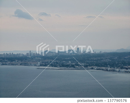 City Skyline Evening, Dusk Illuminates Distant Cityscape Overlooking Calm Water With Ferry Navigation Maps City Skyline Evening, Dusk Illuminates Distant Cityscape Overlooking Calm Water With Ferry Navigation Maps 137790576