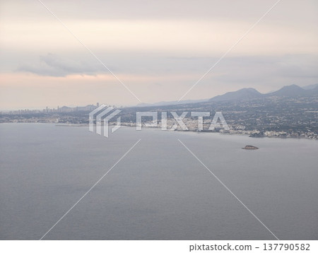 Morning Waterfront Scene, Tranquil Coastal Town At Dawn Displaying Gentle Pastel Shades And Marina Views 137790582