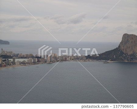 Seaside Cityscape Contrast, Coastal Urban Area With Natural Rock Formations And Shipping Activities 137790605