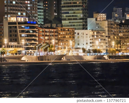 Serene Seaside Pathway Bathed In Gentle Illumination With Reflective Surfaces And Peaceful Ambiance Serene Seaside Pathway Bathed In Gentle Illumination With Reflective Surfaces And Peaceful Ambiance 137790721