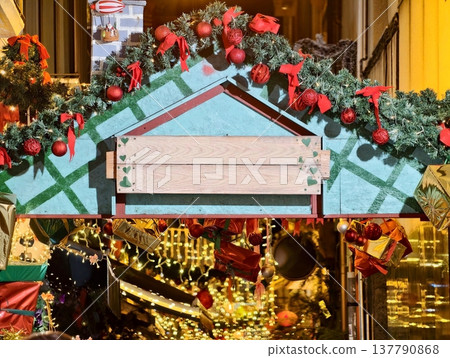 Yuletide Market Featuring Ornaments, Seasonal Storefront Adorned With Lights And Decorations Yuletide Market Featuring Ornaments, Seasonal Storefront Adorned With Lights And Decorations 137790868
