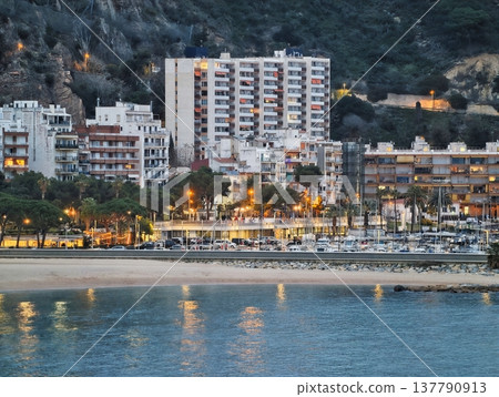 Evening Shoreline View, Twilight Luxury Retreat With Bright Terraces And Peaceful Sea Surface Evening Shoreline View, Twilight Luxury Retreat With Bright Terraces And Peaceful Sea Surface 137790913