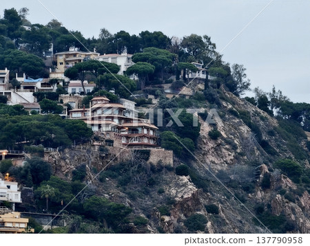 Architectural Masterpieces Perched On Steep Rocky Coasts Beneath Overcast Skies With Dense Pine Forests Architectural Masterpieces Perched On Steep Rocky Coasts Beneath Overcast Skies With Dense Pine Forests 137790958