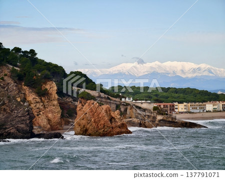 Scenic Coastal Mountain, Dramatic Seaside Cliffs And Alpine Mountains Beneath Bright Daylight Scene 137791071
