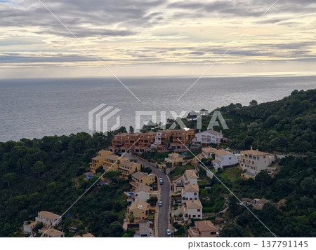 Calm Ocean Horizon Beneath Gentle Pastel Sky Dotted With Fluffy Clouds And Remote Coastlines Calm Ocean Horizon Beneath Gentle Pastel Sky Dotted With Fluffy Clouds And Remote Coastlines 137791145