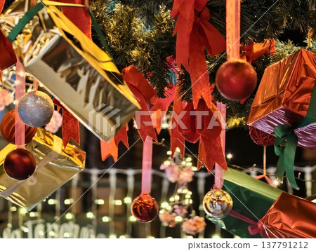 Holiday Decorations Glow, Seasonal Evergreen Decorations Highlighted By Glowing Lights And Shiny Accents 137791212