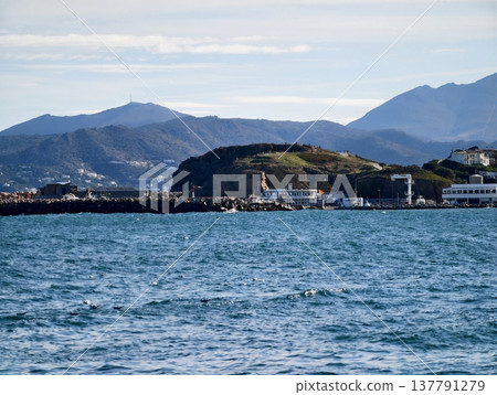 Harbor With Boats And Mountains, Marina Entrance Framed By Mountains Under Gentle Sky Ambiance 137791279