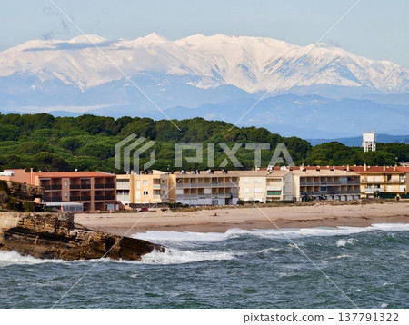 Beautiful Seaside With Mountain Backdrop, Spectacular Beachside Setting With Snowcovered Peaks Overhead Beautiful Seaside With Mountain Backdrop, Spectacular Beachside Setting With Snowcovered Peaks Overhead 137791322
