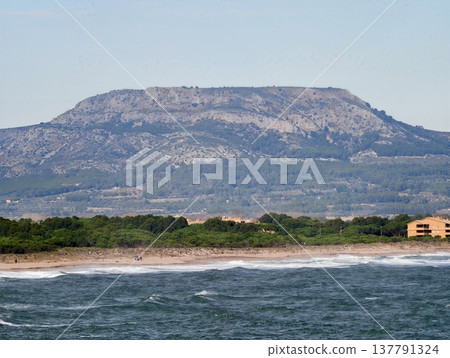 Stunning Rocky Coastline, Majestic Natural Landscape Showcasing Tiered Stones Along Serene Seaside Stunning Rocky Coastline, Majestic Natural Landscape Showcasing Tiered Stones Along Serene Seaside 137791324