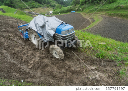 A photograph of terraced rice fields in Shimoakasaka, Chihayaakasaka Village, Osaka Prefecture, taken before rice planting. A photograph of terraced rice fields in Shimoakasaka, Chihayaakasaka Village, Osaka Prefecture, taken before rice planting. 137791397